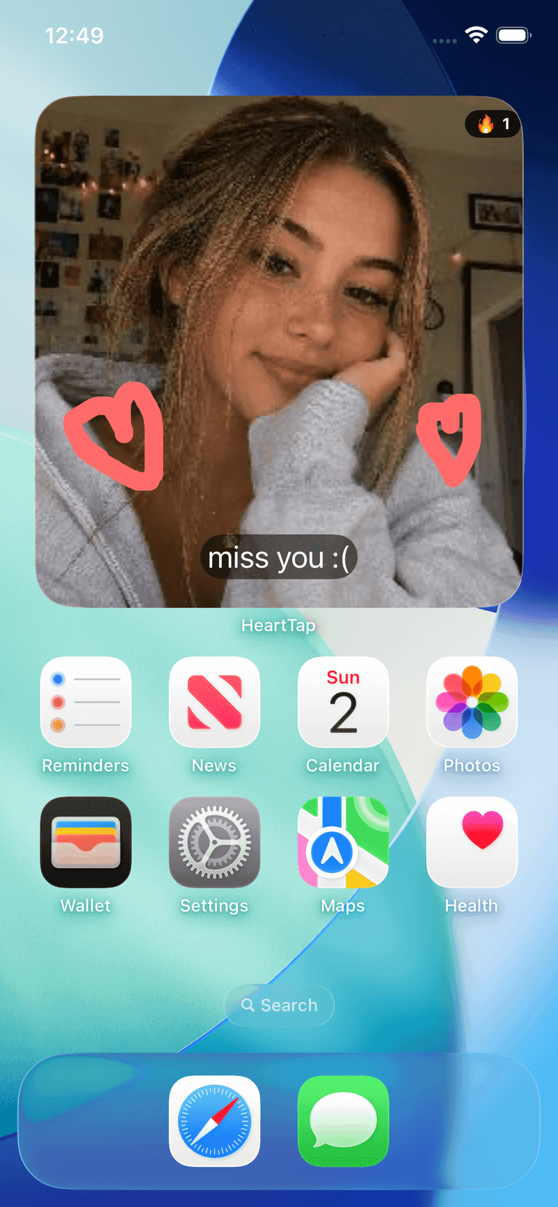 HeartTap couple photo widget on an iPhone home screen showing a partner photo with drawn hearts and the caption miss you